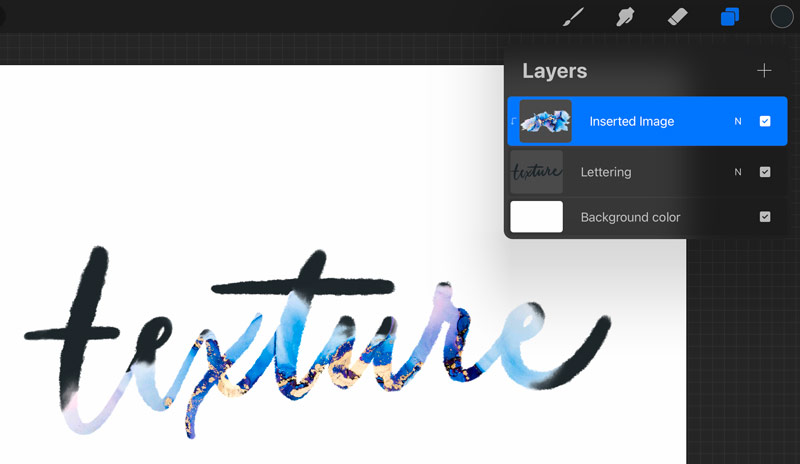 hand lettering with an ink texture clipping mask layer