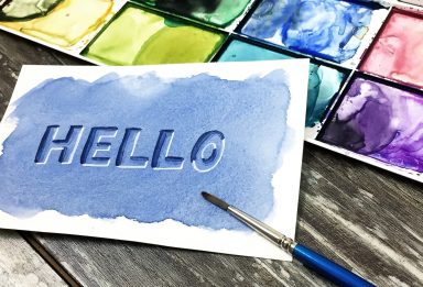 create a debossed watercolor lettering effect